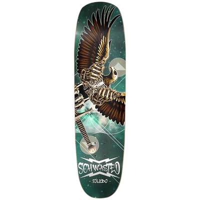 Skateboard deck with an eagle design and 'Schwasted Toledo' branding on a white background